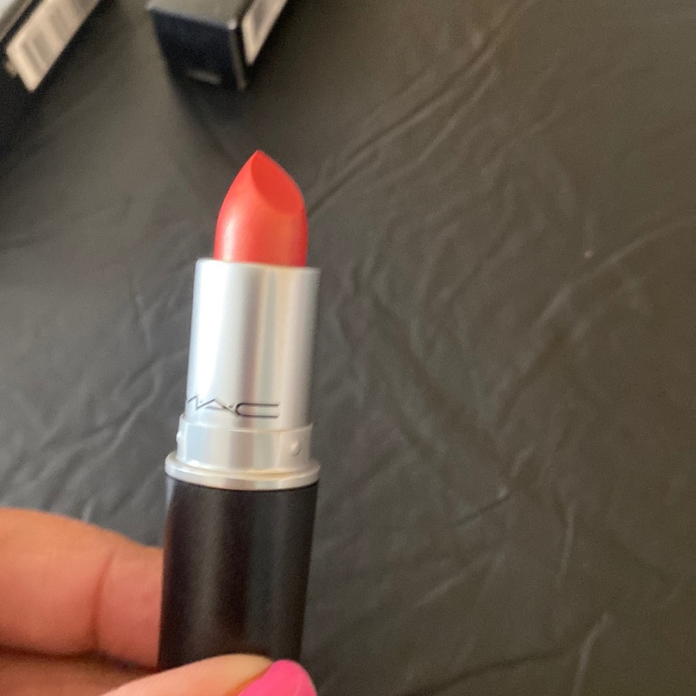 New MAC frost lipstick 305 CB96 sexy orange in color frost. Beautiful shade